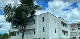 Tupeu: un dezvoltator cere Primăriei despăgubiri după ce a construit ilegal un bloc lângă podul Bucium