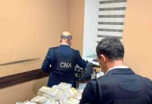 FOTO- VIDEO Percheziții în Chișinău într-un dosar de finanțare ilegală a unor formațiuni politice. Au fost ridicate peste 20 de milioane de lei